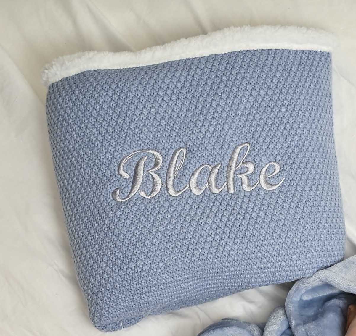 Babies Dusky Blue knitted blanket is super soft and thick, perfect for keeping your little one warm and cosy. With a sherpa lining to the back and embroidered personalisation to the front. Size 75x90cm.