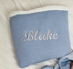 Load image into Gallery viewer, Babies Dusky Blue knitted blanket is super soft and thick, perfect for keeping your little one warm and cosy. With a sherpa lining to the back and embroidered personalisation to the front. Size 75x90cm.
