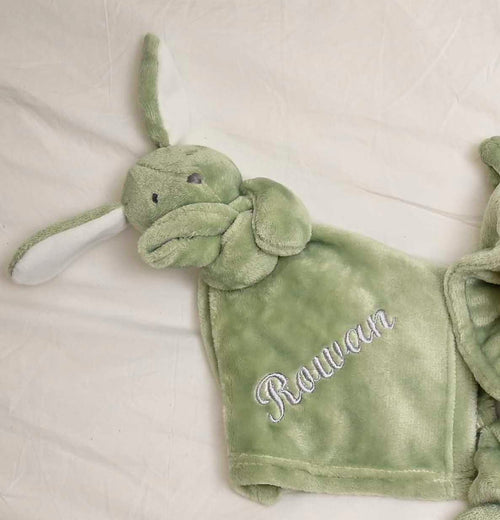 our Babies personalised bunny comforter in Green is crafted from super soft plush material, this comforter will keep your baby snug and content. Complete with your babies name personalised/embroidered to the front.
