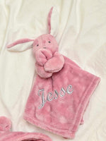 Load image into Gallery viewer, our Babies personalised bunny comforter in Dusky Pink is crafted from super soft plush material, this comforter will keep your baby snug and content. Complete with your babies name personalised/embroidered to the front.
