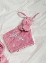 Load image into Gallery viewer, our Babies personalised bunny comforter in Dusky Pink is crafted from super soft plush material, this comforter will keep your baby snug and content. Complete with your babies name personalised/embroidered to the front.
