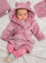 Load image into Gallery viewer,  Babies personalised Dusky Pink hooded dressing gown. Made from super soft material, it features an elephant embroidery to the chest as well as detailing pom pom ears and a hood. Make it extra special by adding a personalised touch.
