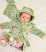 Load image into Gallery viewer,  Babies personalised Green hooded dressing gown. Made from super soft material, it features an elephant embroidery to the chest as well as detailing pom pom ears and a hood. Make it extra special by adding a personalised touch.
