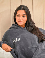 This ladies Charcoal long line over sizes hoody is made from a luxurious heavy weight bonded fabric and is fully borg lines throughout the entire hoody- making it a winter essential. With a hood, kangaroo pocket to the front and your personalised name embroidered to the chest.