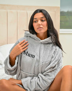 Ladies oversized hoody in Light Grey is perfect for the cold nights. With super soft plush fabric, hood to the back and a kangaroo pocket to the front. Completed with a fully lined hood and your name embroidered to the front chest.